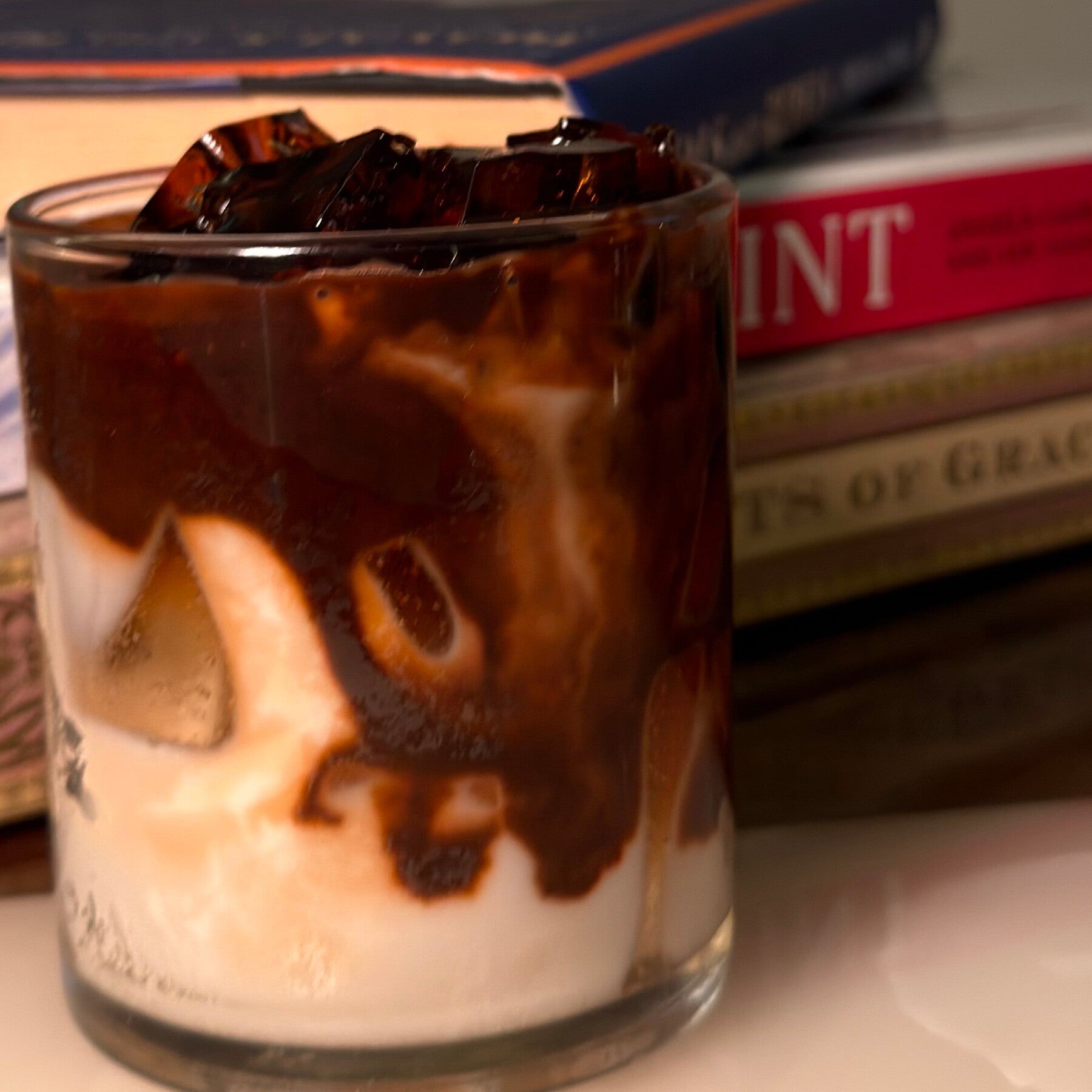 Cold coffee candle with soy wax base and realistic gel wax ice cubes